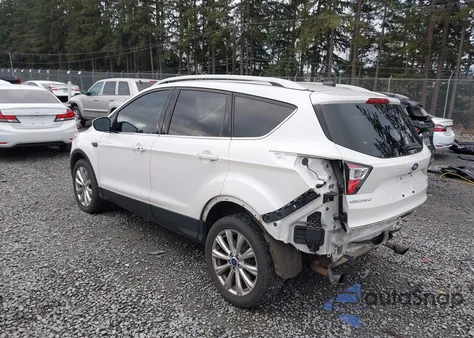 2017 Ford Escape Titanium z USA, uszkodzony, nr VIN 1FMCU9J99HUA83253